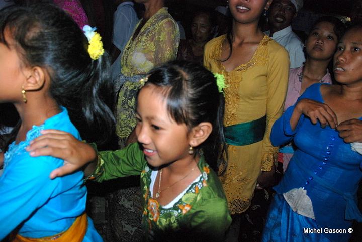 MGA93134.JPG - VIllage religious parade. The women wear translucent blouse and a belt, that separate the good body parts from the "problematic" one. The men also wear a similar belt.