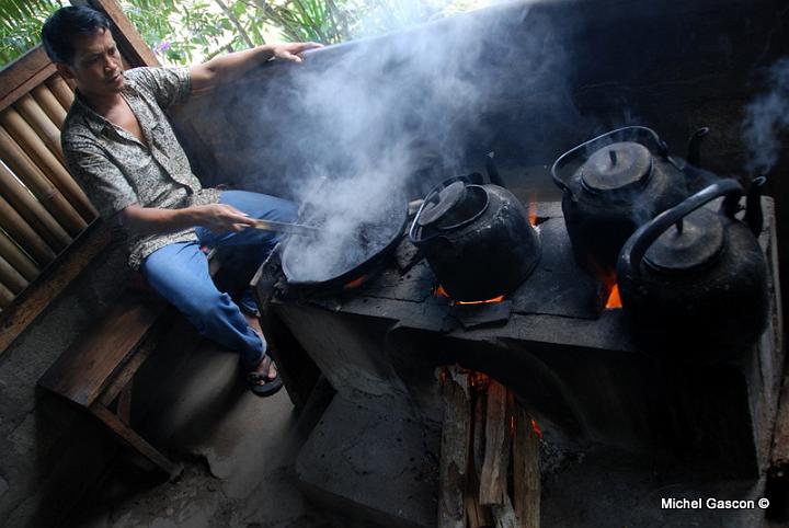 MGA93225.jpg - Tending the fire by a hot day, all day.